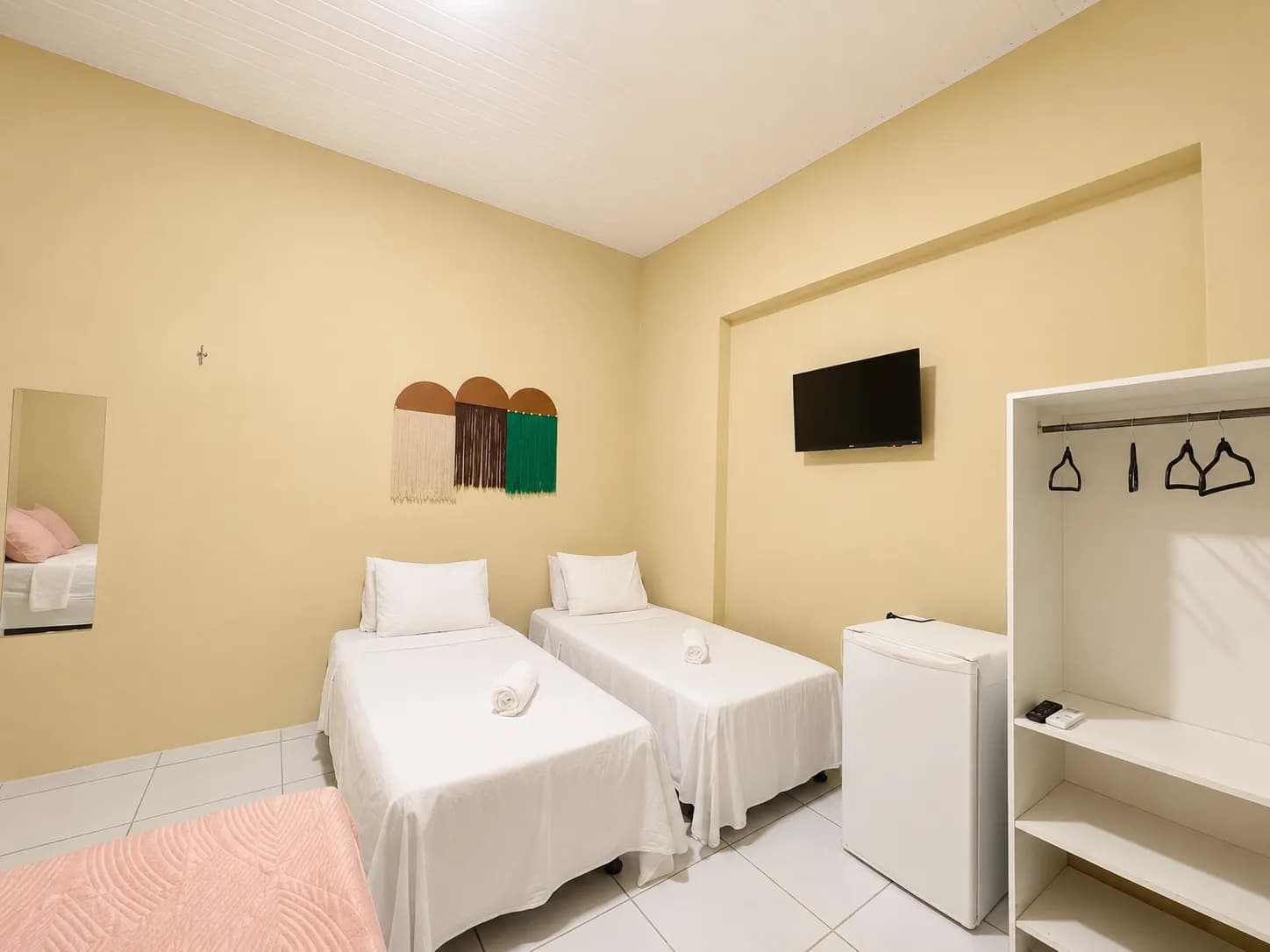 Ambiente do quarto na pousada em Praia de Iracema